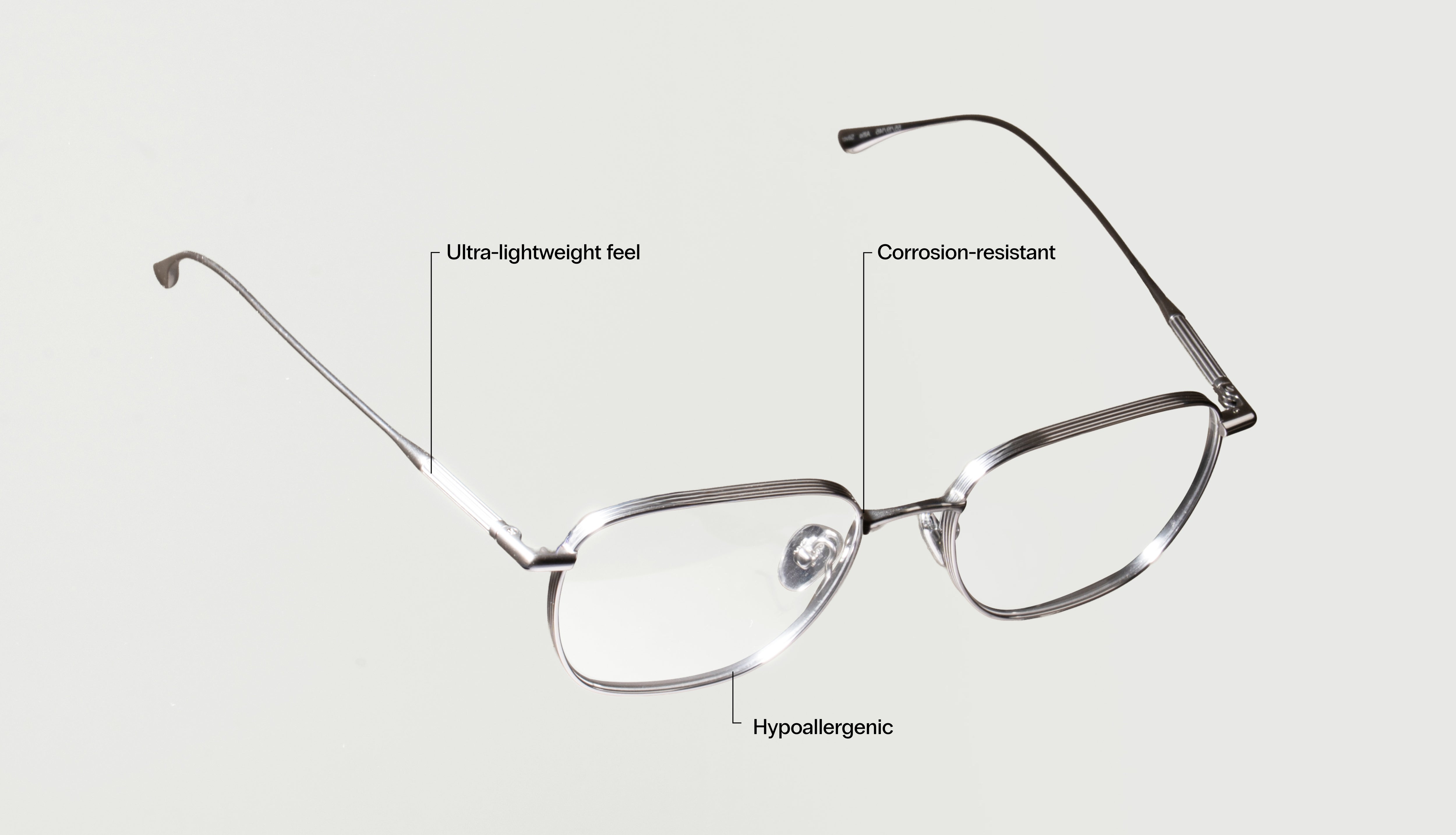 Ultra-lightweight titanium metal eyeglasses with hypoallergenic, corrosion-resistant frame for all-day comfort.