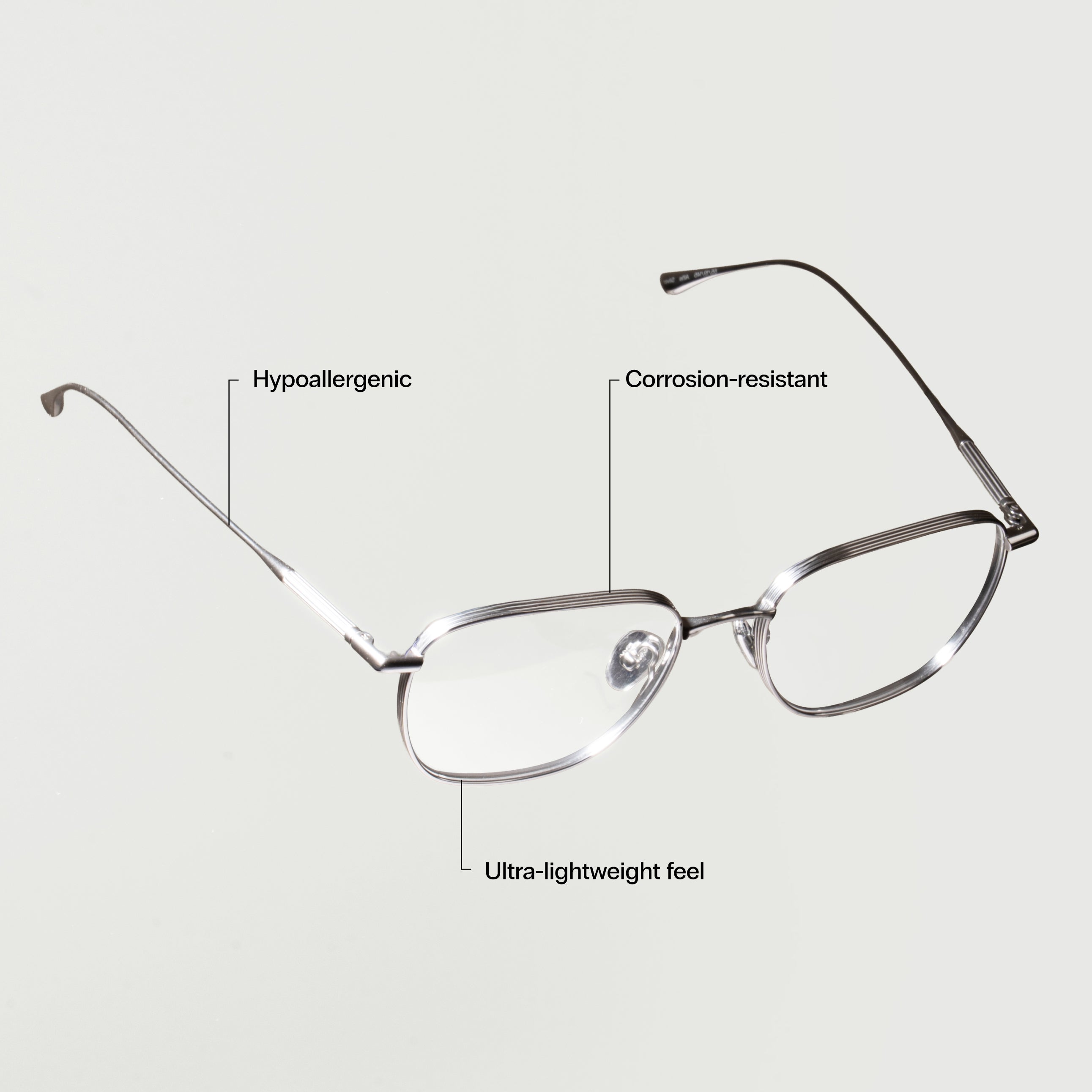 Ultra-lightweight titanium metal eyeglasses with hypoallergenic, corrosion-resistant frame for all-day comfort.