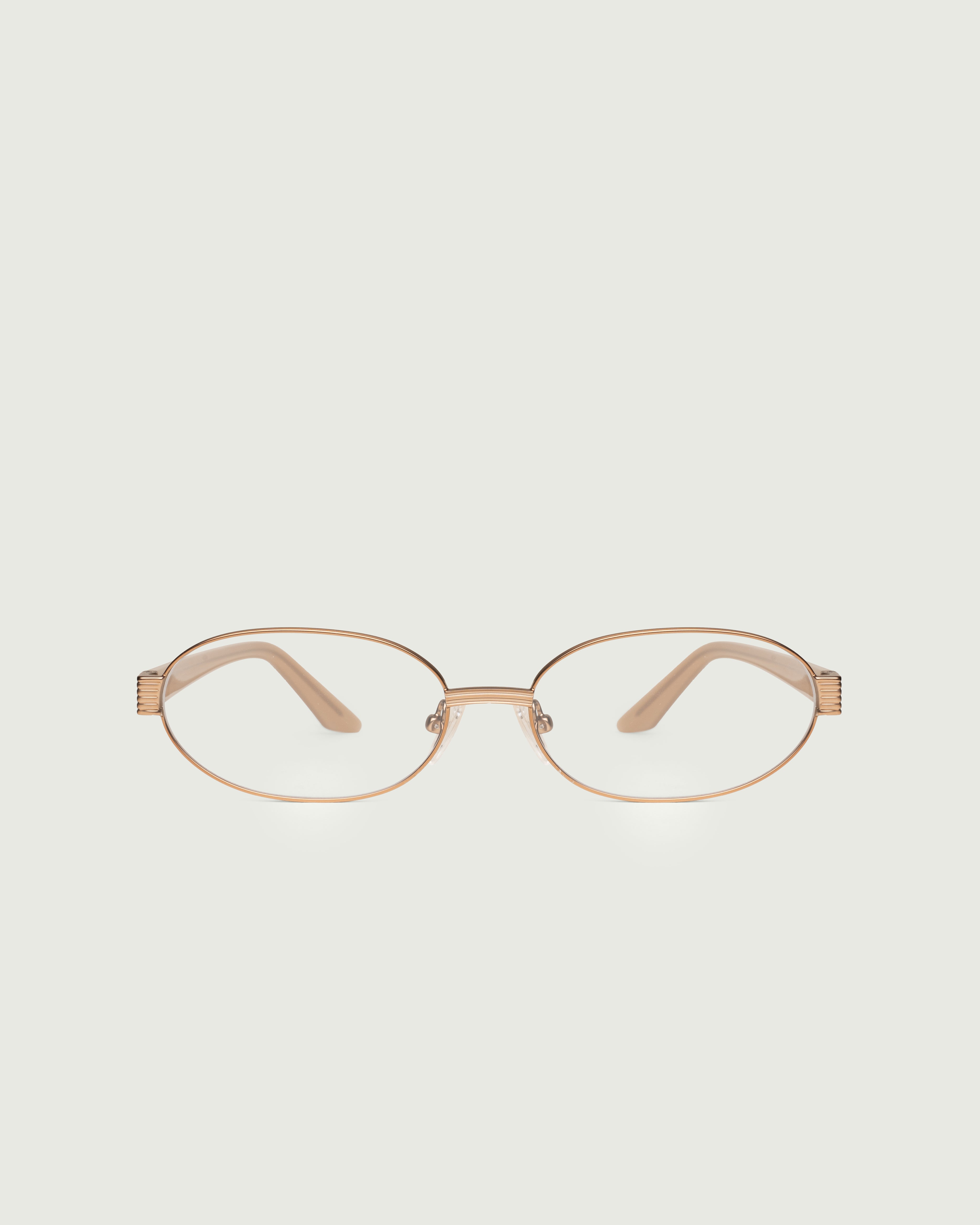 Tan::Penny Eyeglasses oval brown metal front